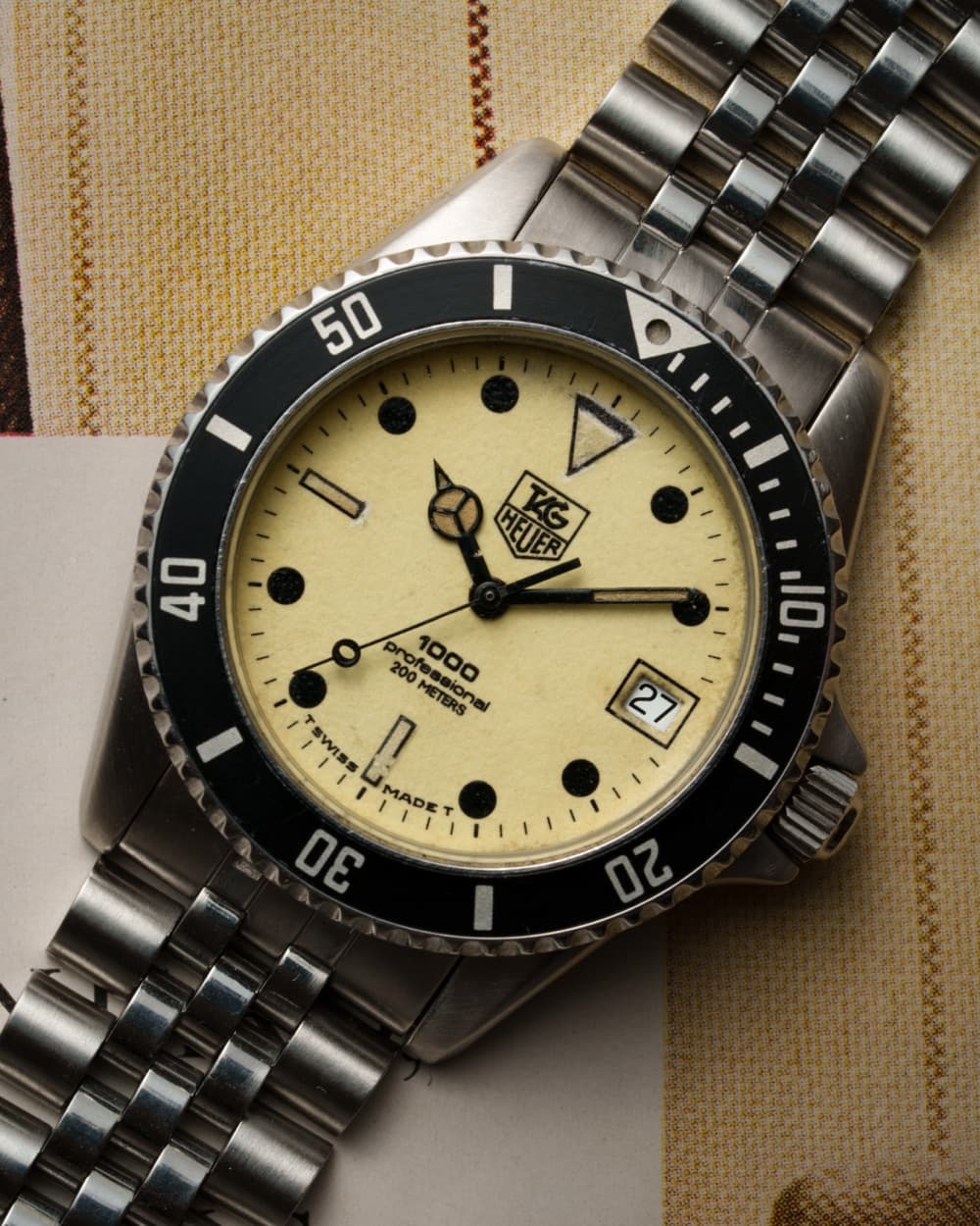 Vintage TAG Heuer diver with cream lume dial on a steel bracelet